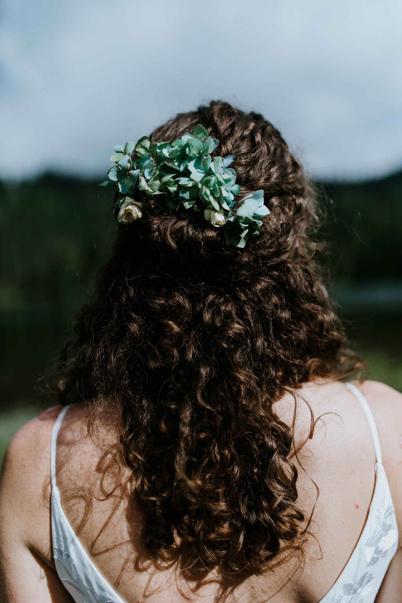 Tasha's hair flowers. Elopement photography at Mount Rainier by Sienna Plus Josh.
