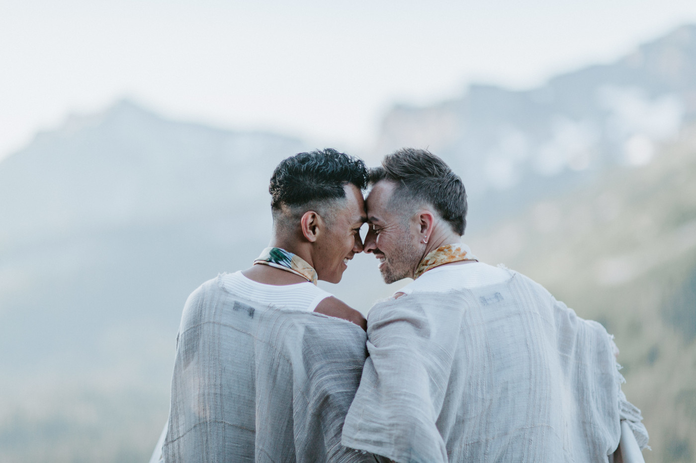 Fred and brooks sit together after their Mount Rainier Elopement.