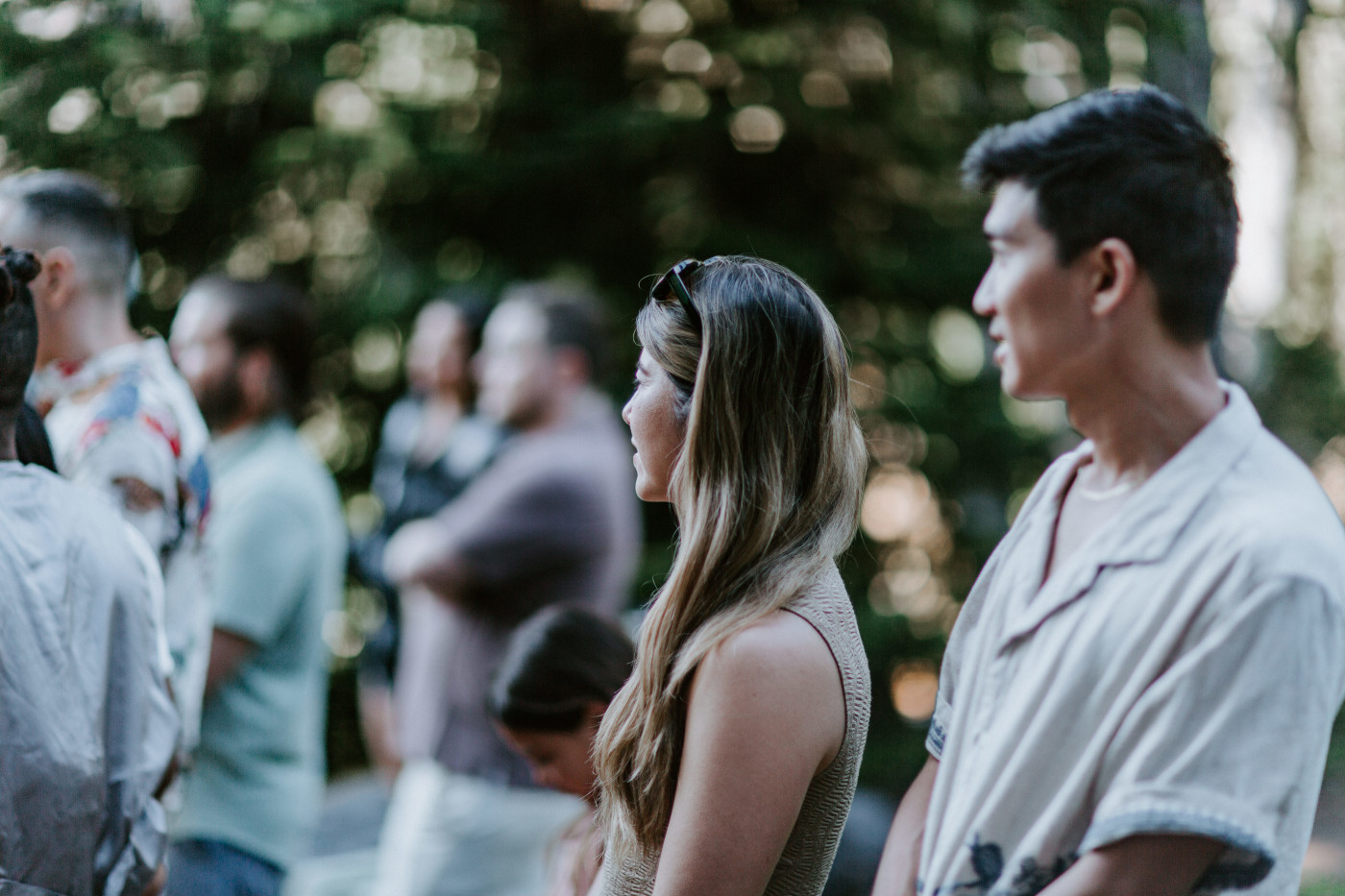 Friends look on during the elopement of Brooks and Fred in Mount Rainier.
