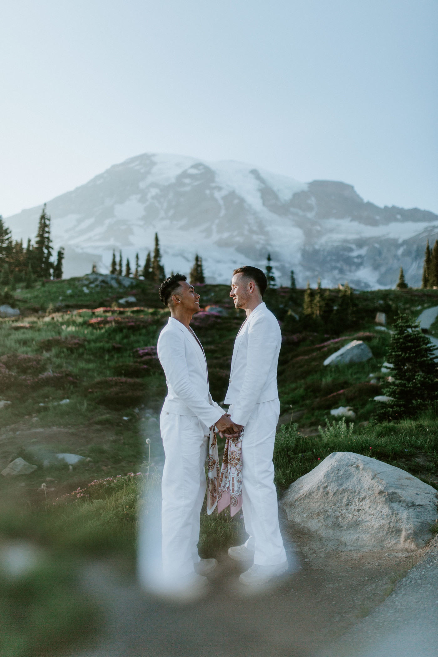 Fred and Brooks hold hands after their Mount Rainier Elopement.