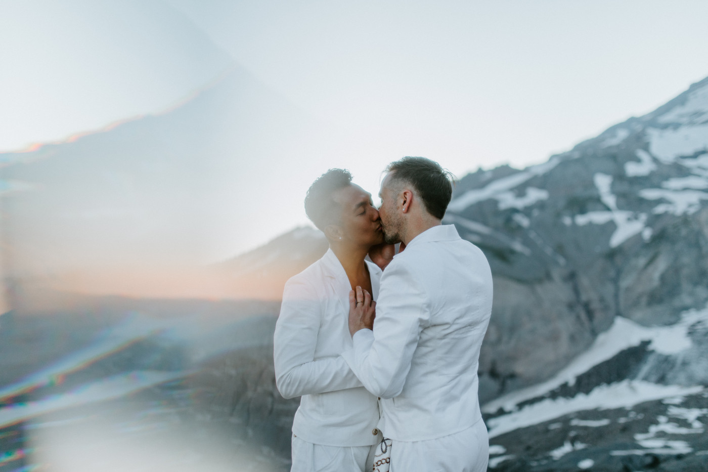 Brooks and Fred kiss in Mount Rainier.