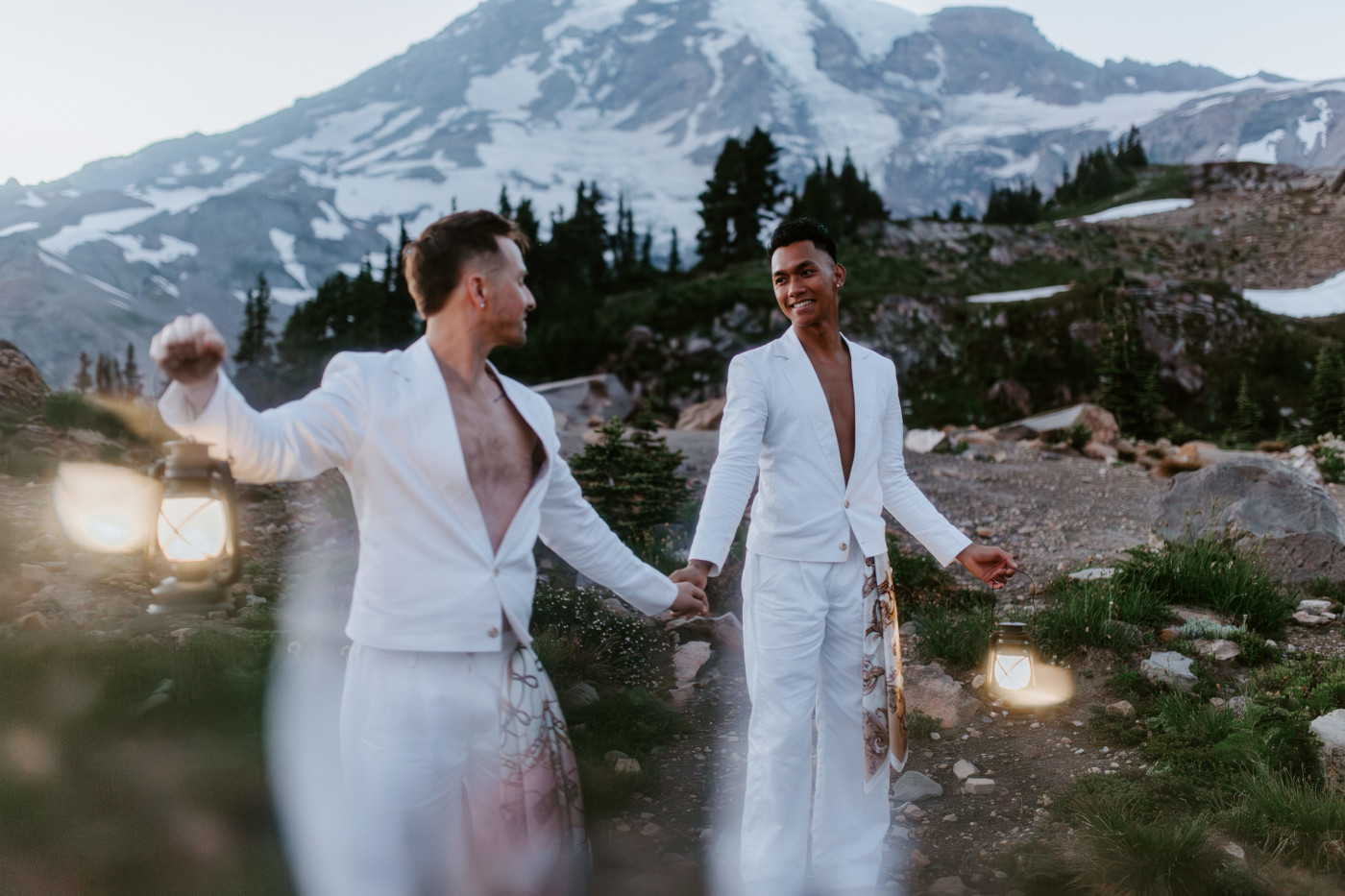 Brooks and Fred with lanterns after their elopement ceremony in Mount Rainier, Washington.