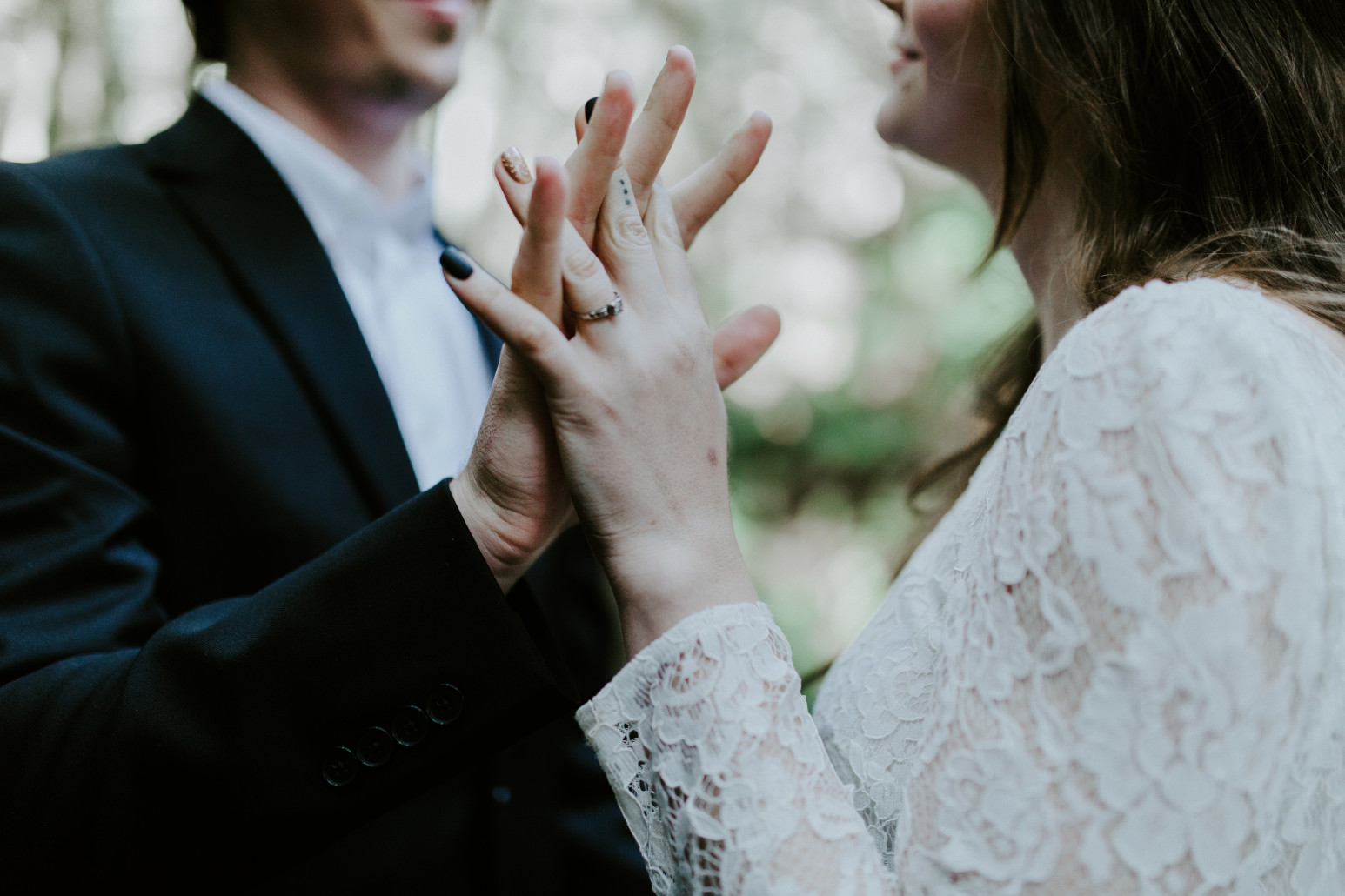 Vlad and Nicole hold hands. Elopement wedding photography at Cannon Beach by Sienna Plus Josh.