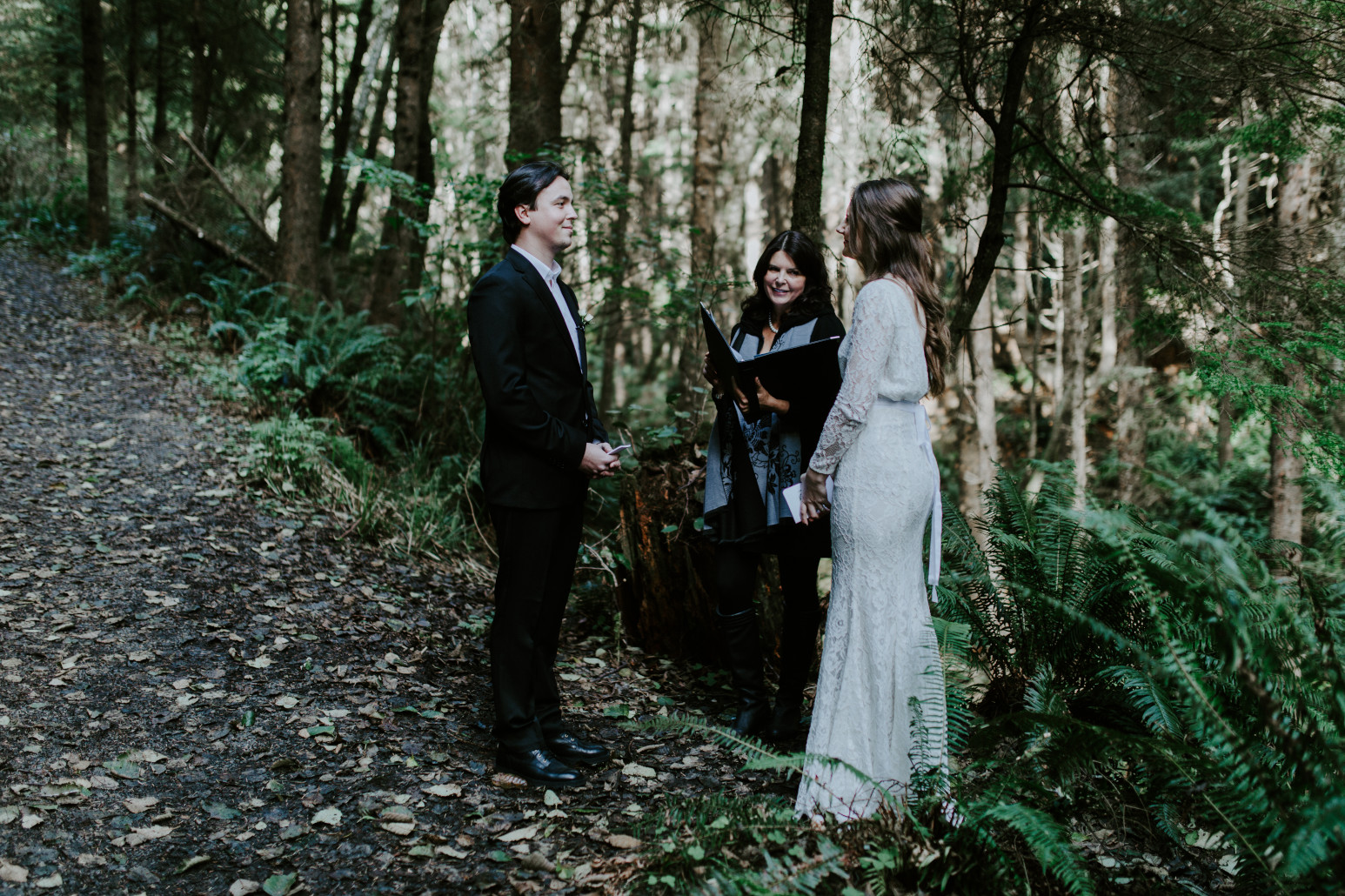Nicole and Vlad during their elopement ceremony at Cannon Beach. Elopement wedding photography at Cannon Beach by Sienna Plus Josh.