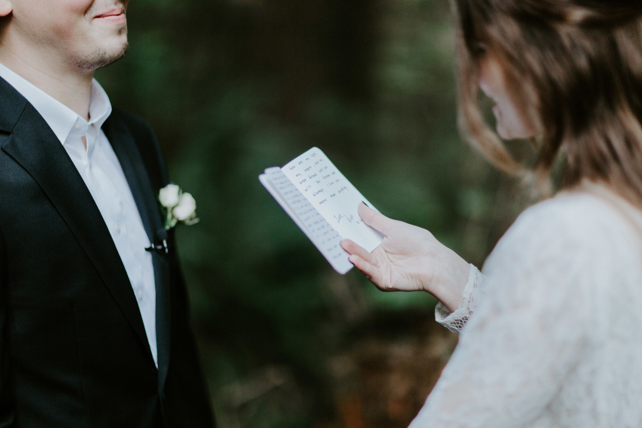 Vlad smiles at Nicole during their ceremony. Elopement wedding photography at Cannon Beach by Sienna Plus Josh.