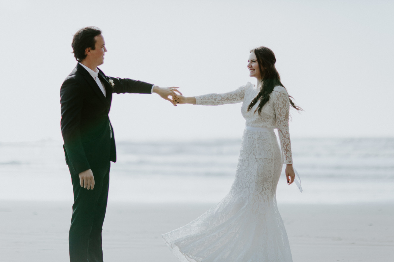Nicole and Vlad dancing on the beach. Elopement wedding photography at Cannon Beach by Sienna Plus Josh.