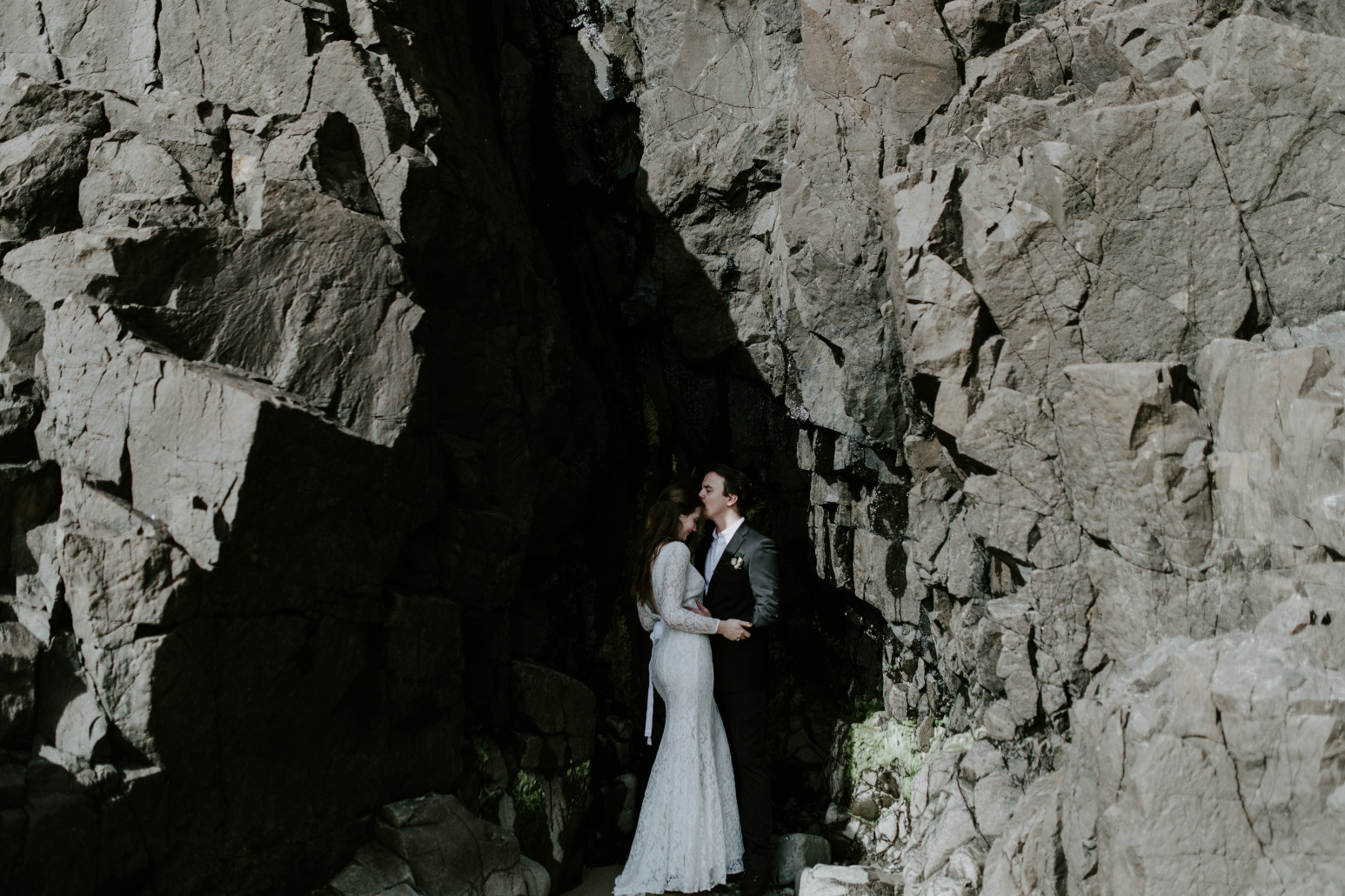 Nicole and Vlad kiss. Elopement wedding photography at Cannon Beach by Sienna Plus Josh.