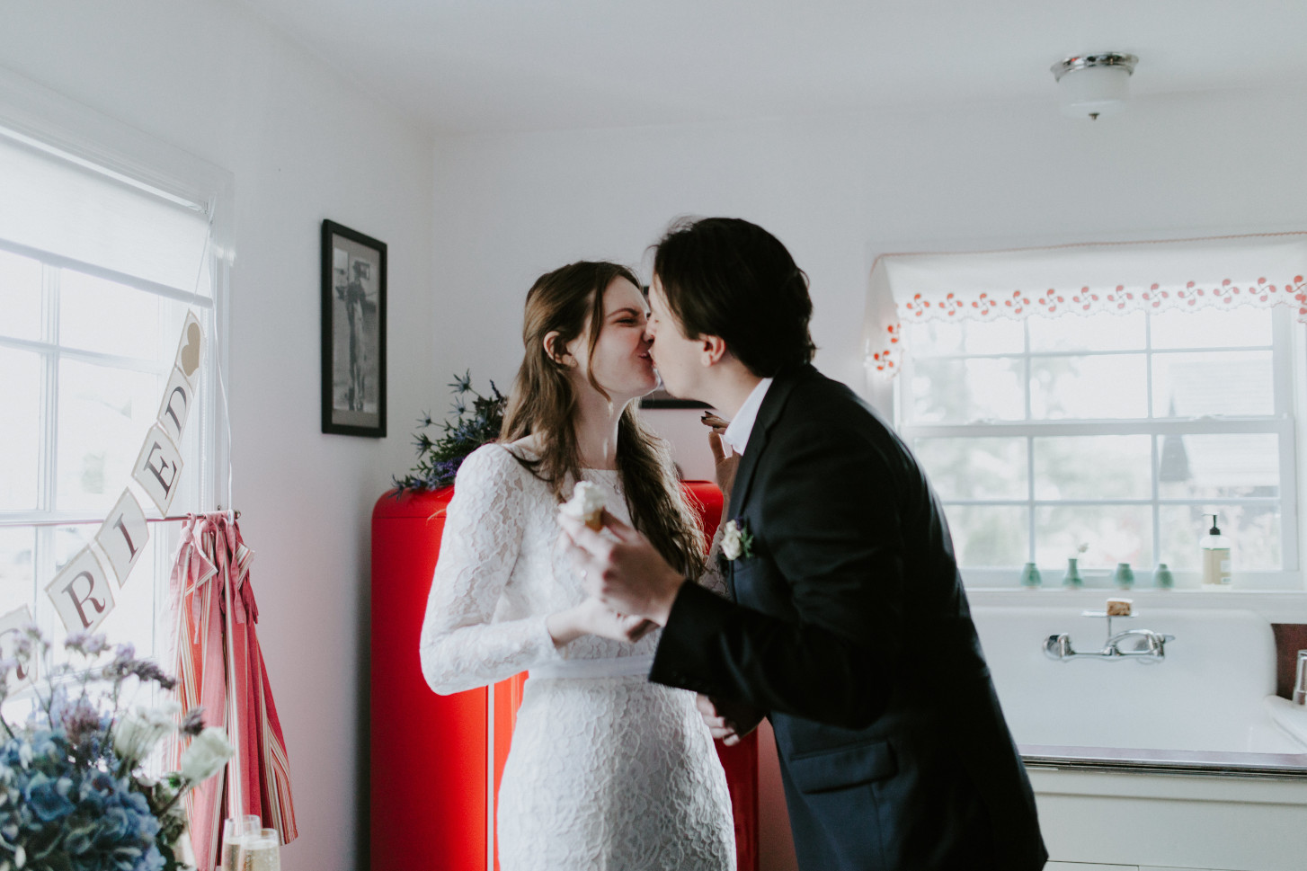 Nicole and Vlad kiss. Elopement wedding photography at Cannon Beach by Sienna Plus Josh.