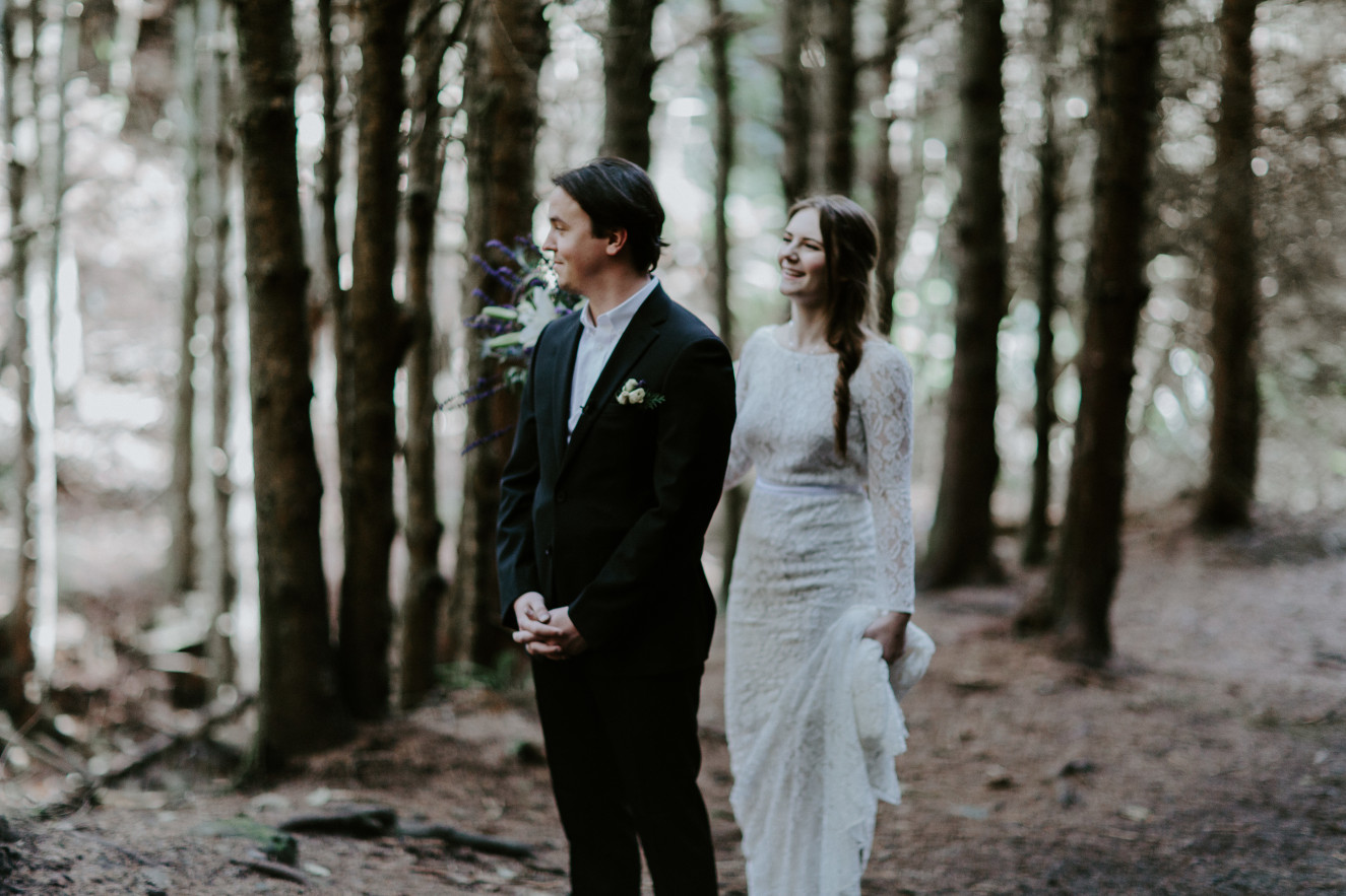 Nicole walks up to Vlad for their first look at Cannon Beach, OR. Elopement wedding photography at Cannon Beach by Sienna Plus Josh.