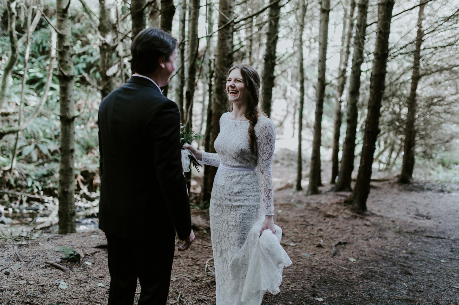 Vlad and Nicole laugh. Elopement wedding photography at Cannon Beach by Sienna Plus Josh.