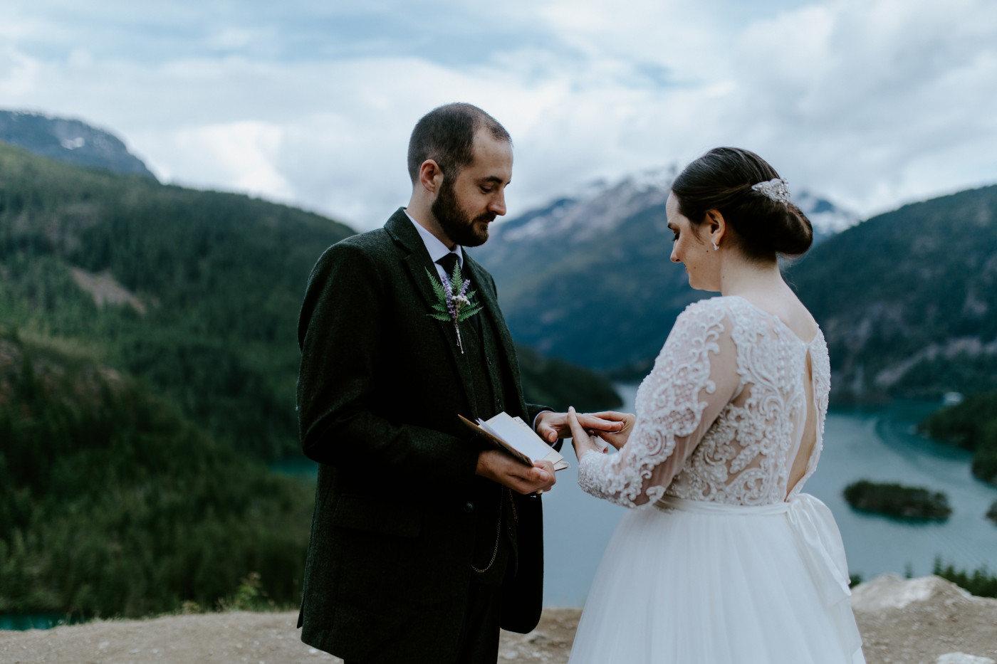 Alex and Elizabeth finalizing the ceremony. Elopement photography at North Cascades National Park by Sienna Plus Josh.