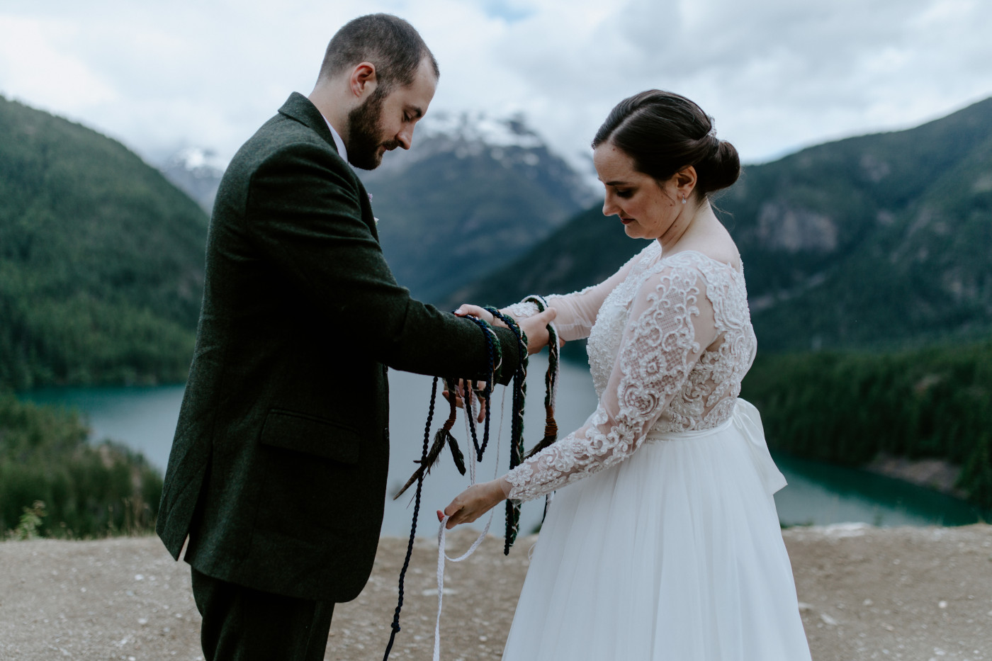 Alex and Elizabeth during their ceremony at Diablo Lake Overlook. Elopement photography at North Cascades National Park by Sienna Plus Josh.