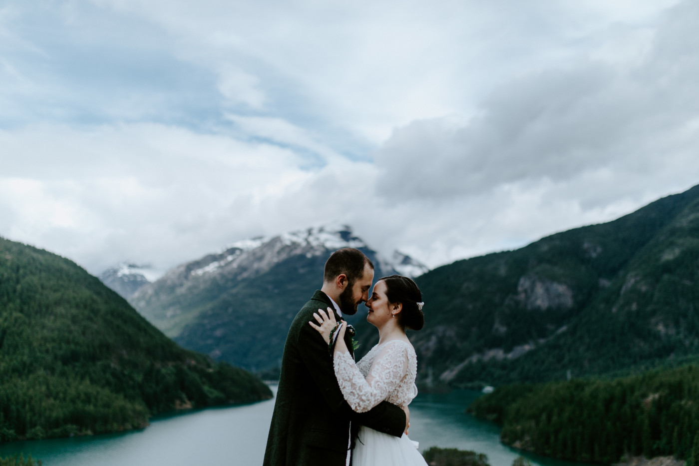 Elizabeth and Alex hugging at the top of Diablo Lake Overlook. Elopement photography at North Cascades National Park by Sienna Plus Josh.