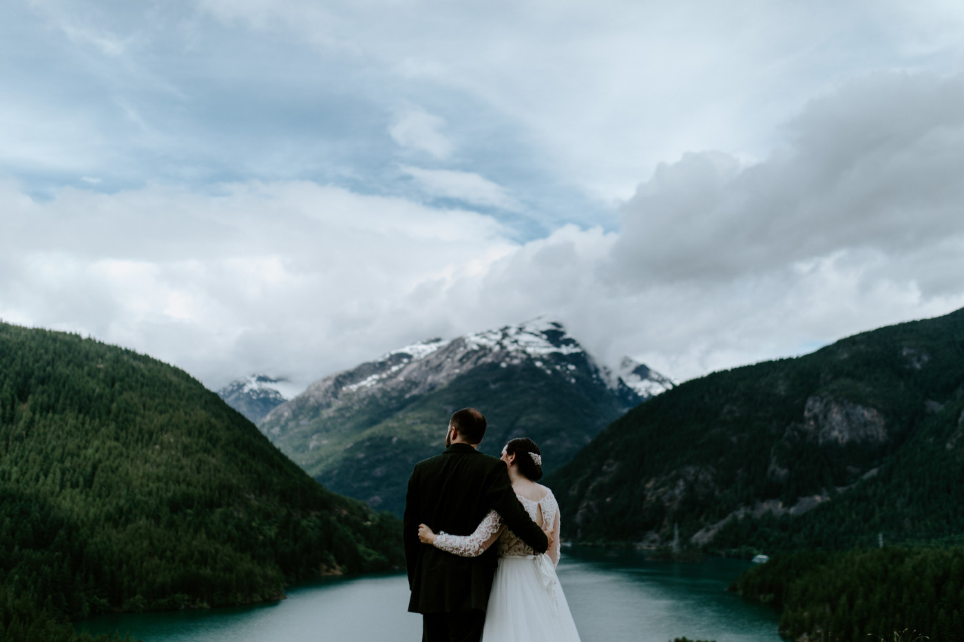 Alex and Elizabeth look out onto Diablo Lake Overlook. Elopement photography at North Cascades National Park by Sienna Plus Josh.