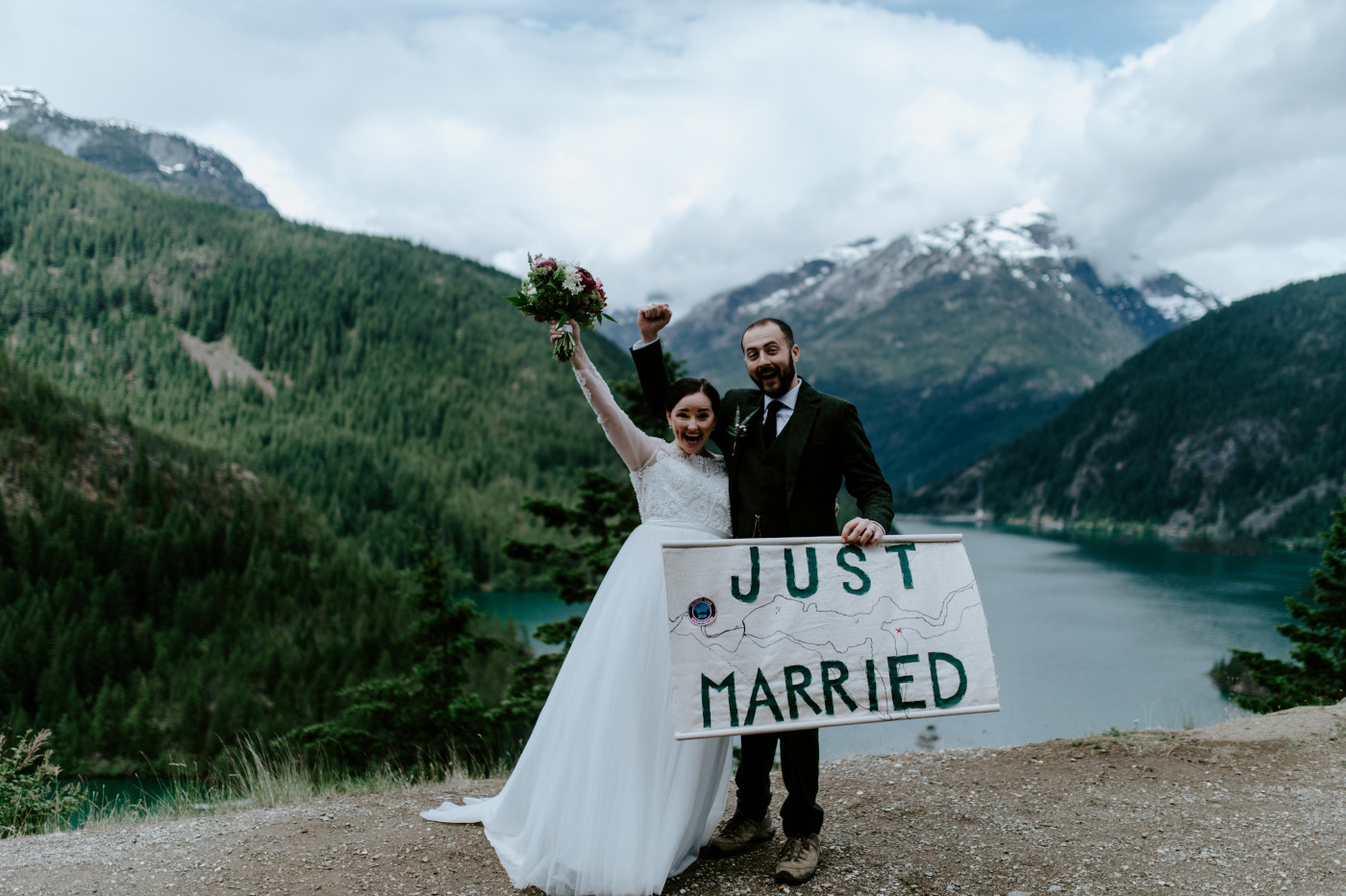 Elizabeth and Alex cheer. Elopement photography at North Cascades National Park by Sienna Plus Josh.