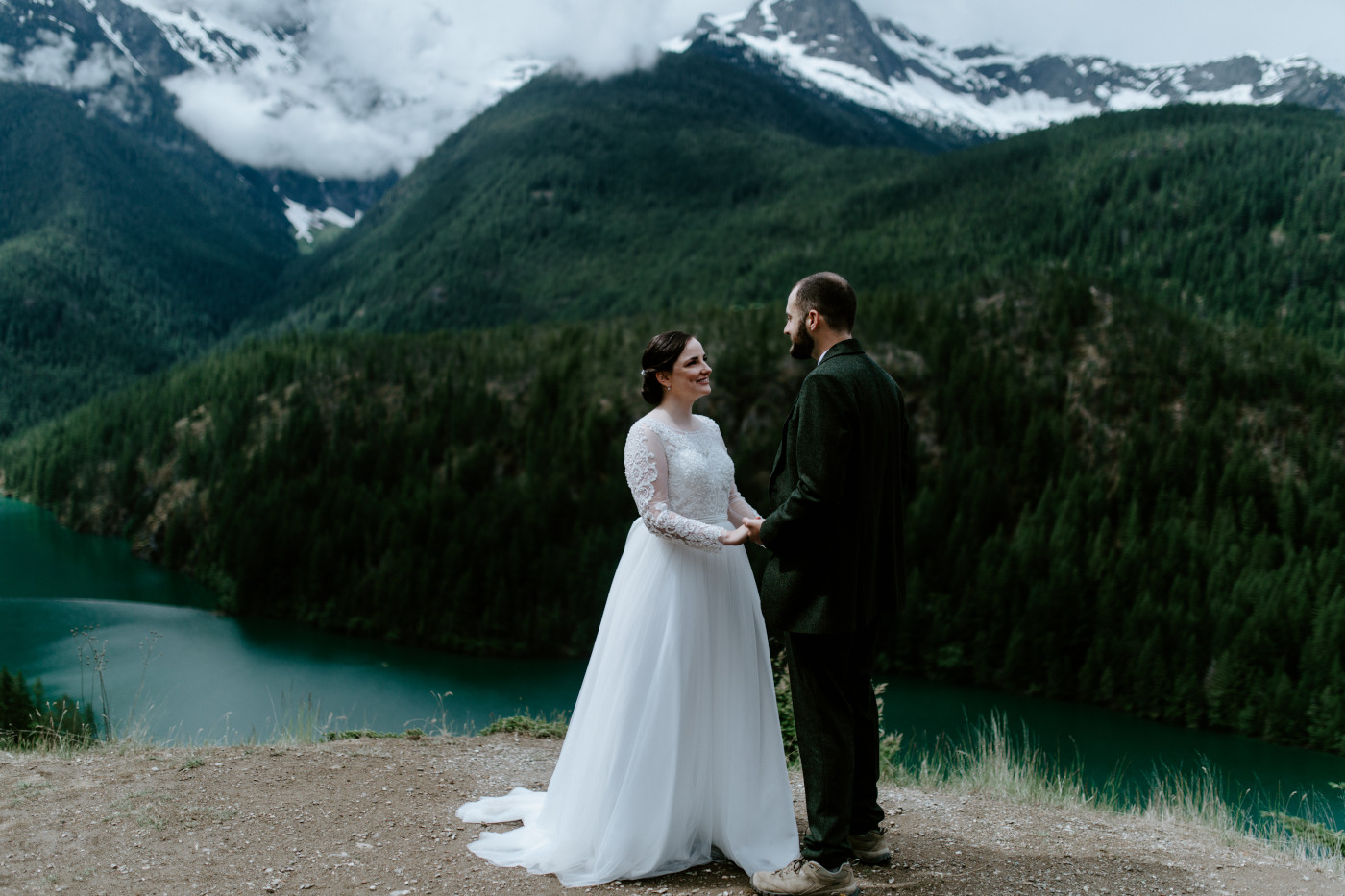 Alex and Elizabeth hold hands. Elopement photography at North Cascades National Park by Sienna Plus Josh.