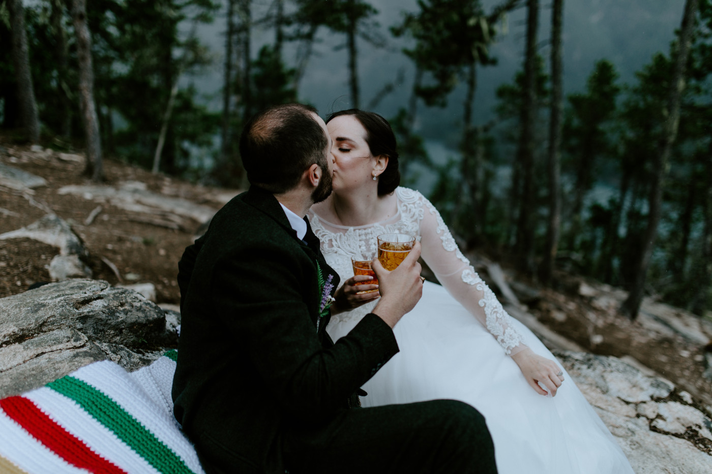 Alex and Elizabeth cheers. Elopement photography at North Cascades National Park by Sienna Plus Josh.