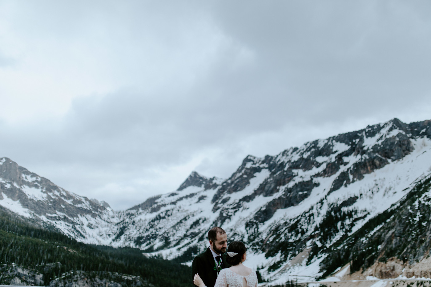 Elizabeth and Alex kiss while dancing. Elopement photography at North Cascades National Park by Sienna Plus Josh.
