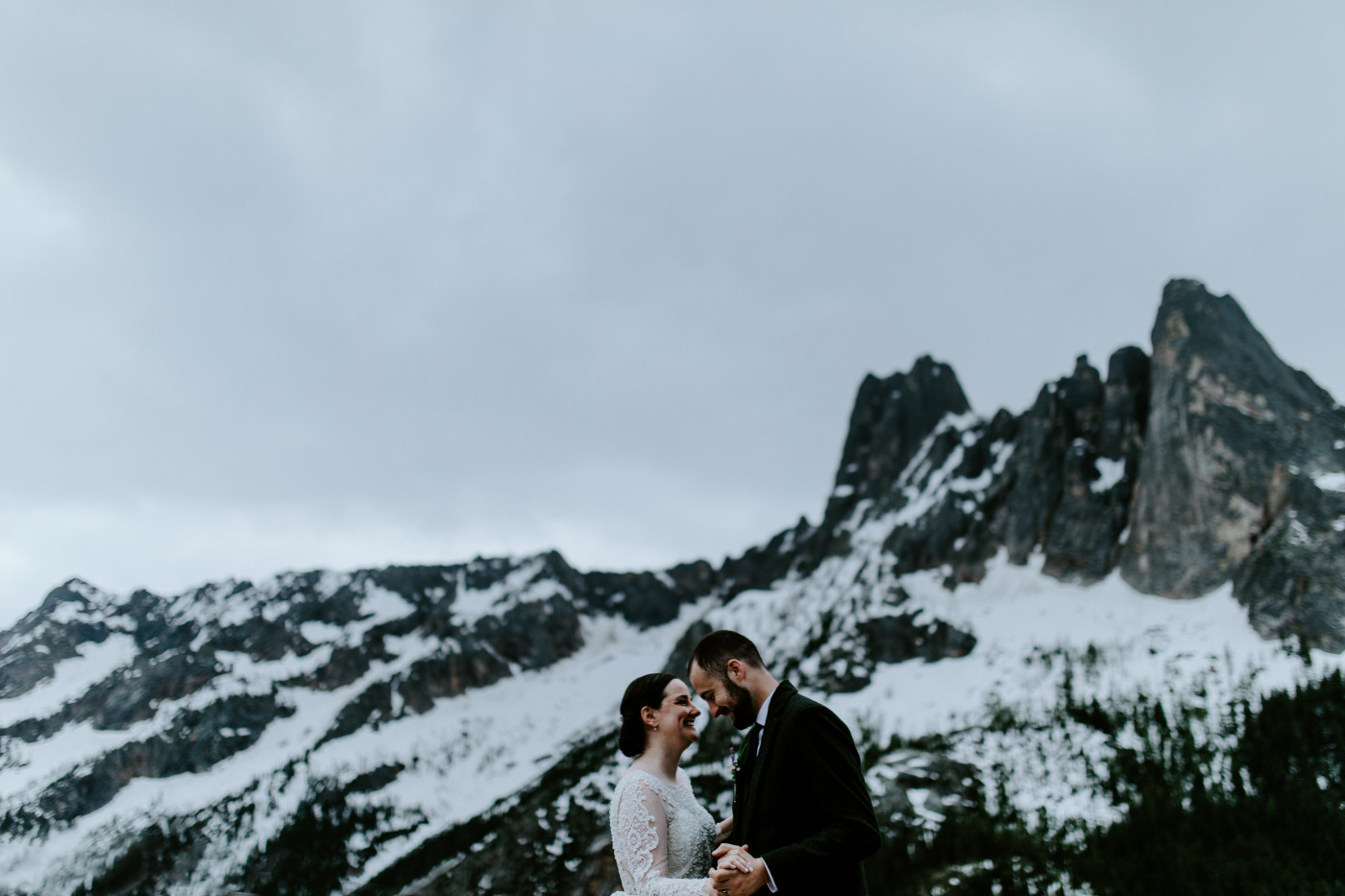 Elizabeth and Alex forehead to forehead. Elopement photography at North Cascades National Park by Sienna Plus Josh.