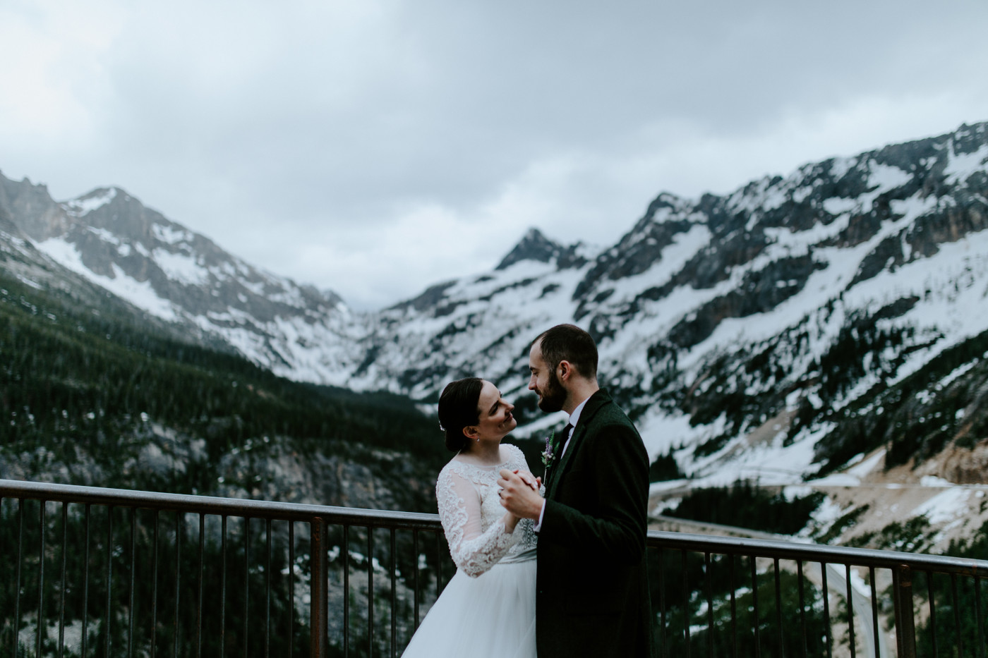 Elizabeth and Alex look at each other. Elopement photography at North Cascades National Park by Sienna Plus Josh.