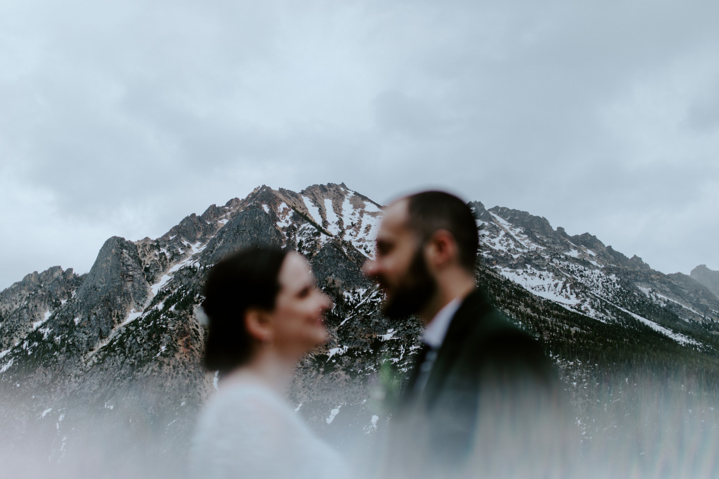 Elizabeth and Alex stand before the mountain. Elopement photography at North Cascades National Park by Sienna Plus Josh.