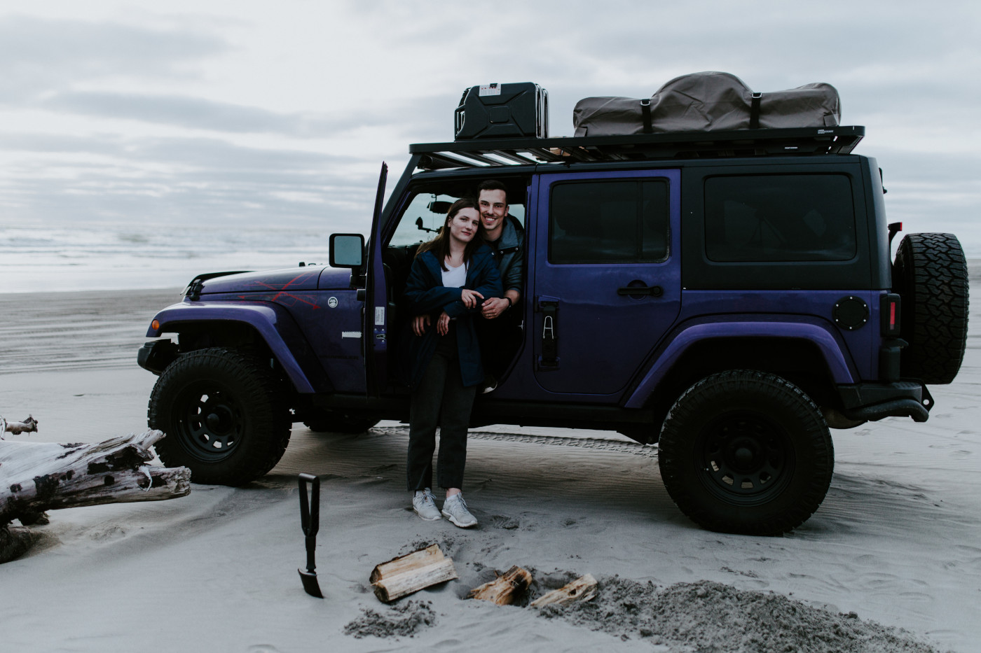 Taylor and Kyle sitting in their Jeep that they took cross country. Elopement photography at North Cascades National Park by Sienna Plus Josh.