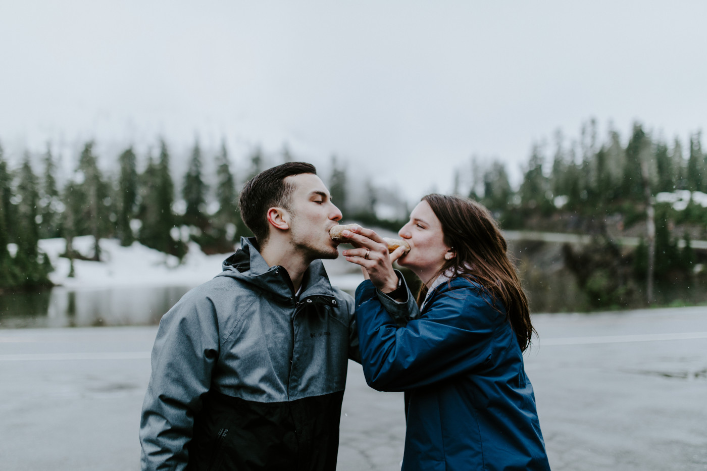 Kyle and Taylor toast with their donuts. Elopement photography at North Cascades National Park by Sienna Plus Josh.
