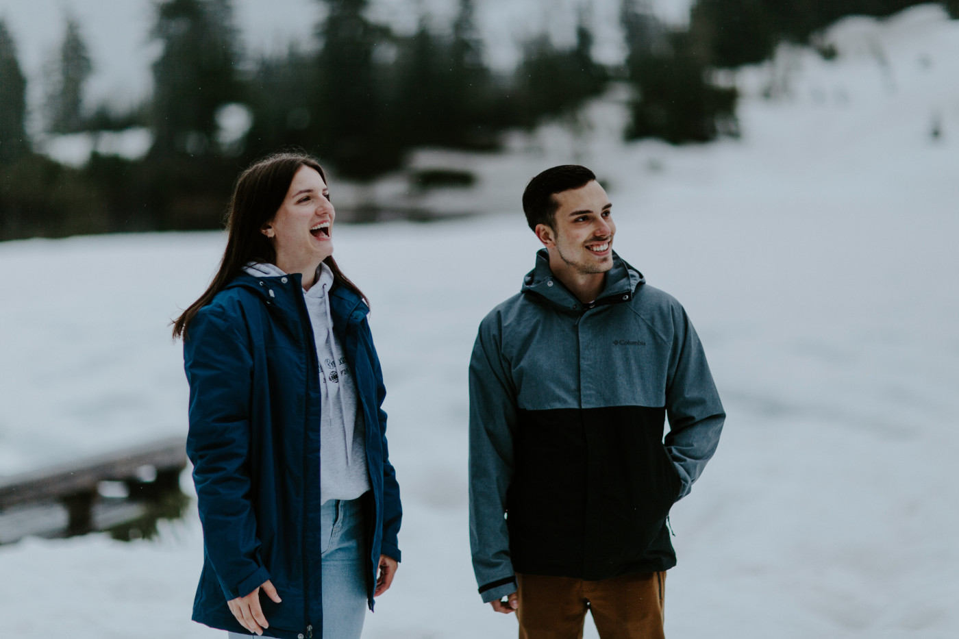 Kyle and Taylor stand side by side in the snow at North Cascades National Park. Elopement photography at North Cascades National Park by Sienna Plus Josh.