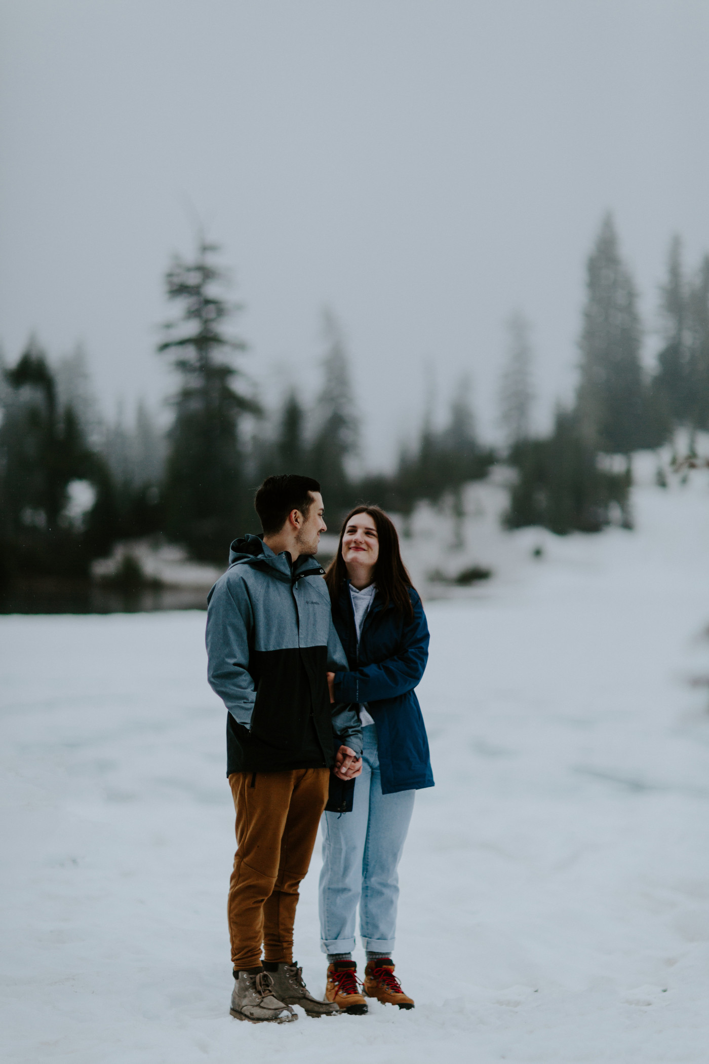 Taylor and Kyle standing face to face during their ceremony. Elopement photography at North Cascades National Park by Sienna Plus Josh.