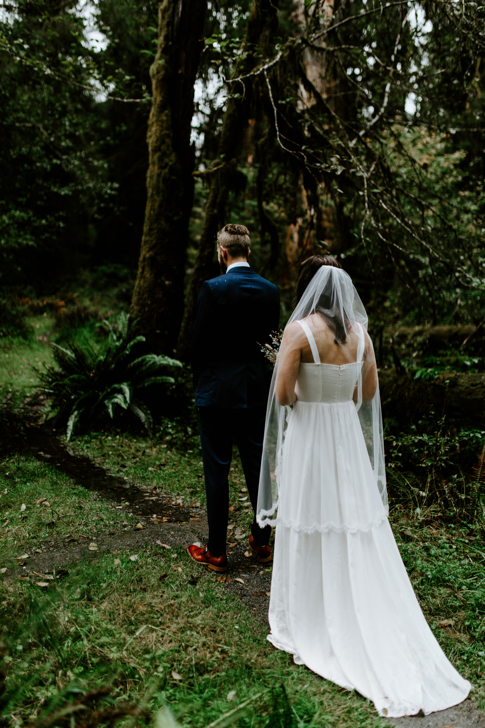 Mollie sneaks up on Corey. Elopement photography in the Olympic National Park by Sienna Plus Josh.