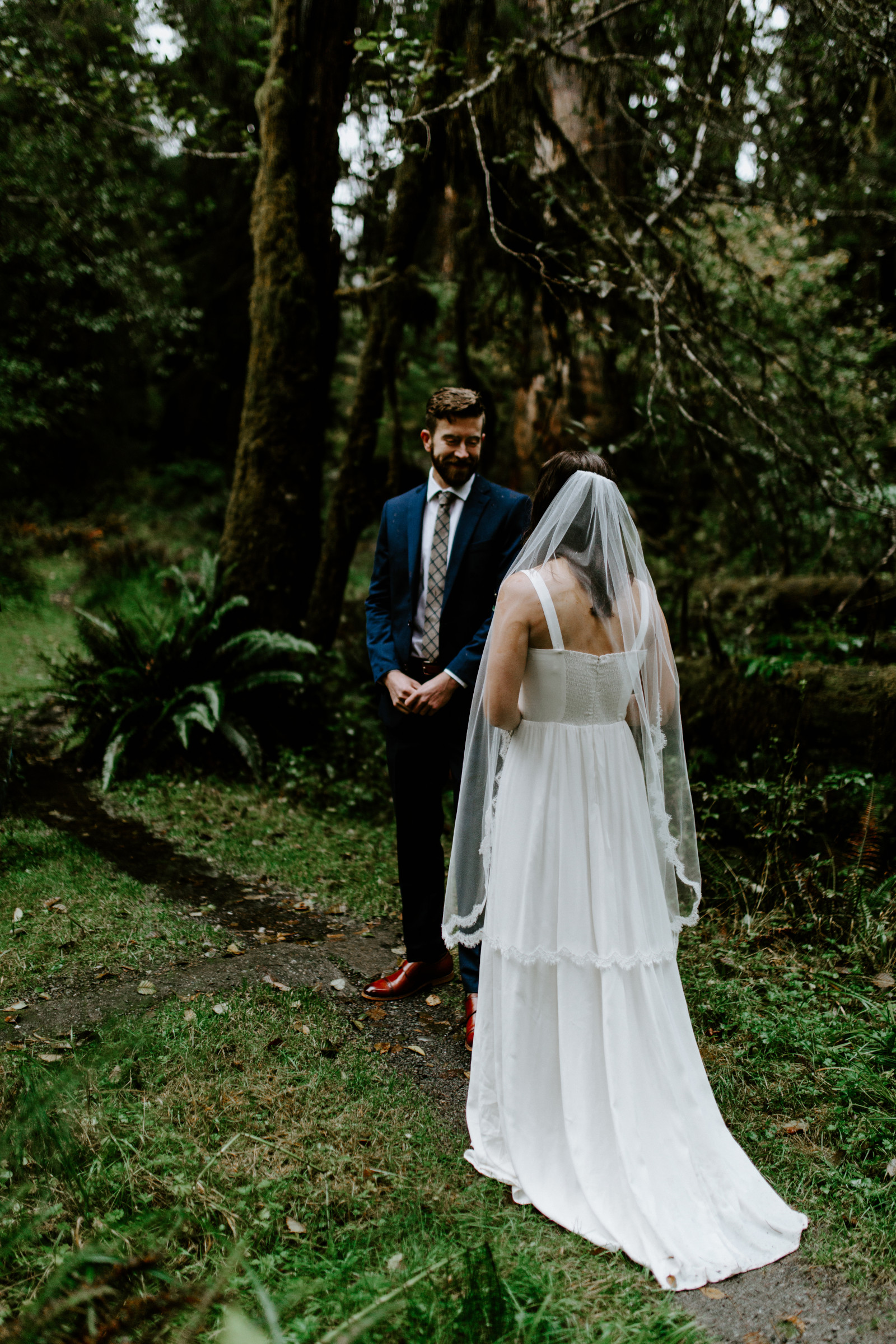 Corey looks at Mollie. Elopement photography in the Olympic National Park by Sienna Plus Josh.