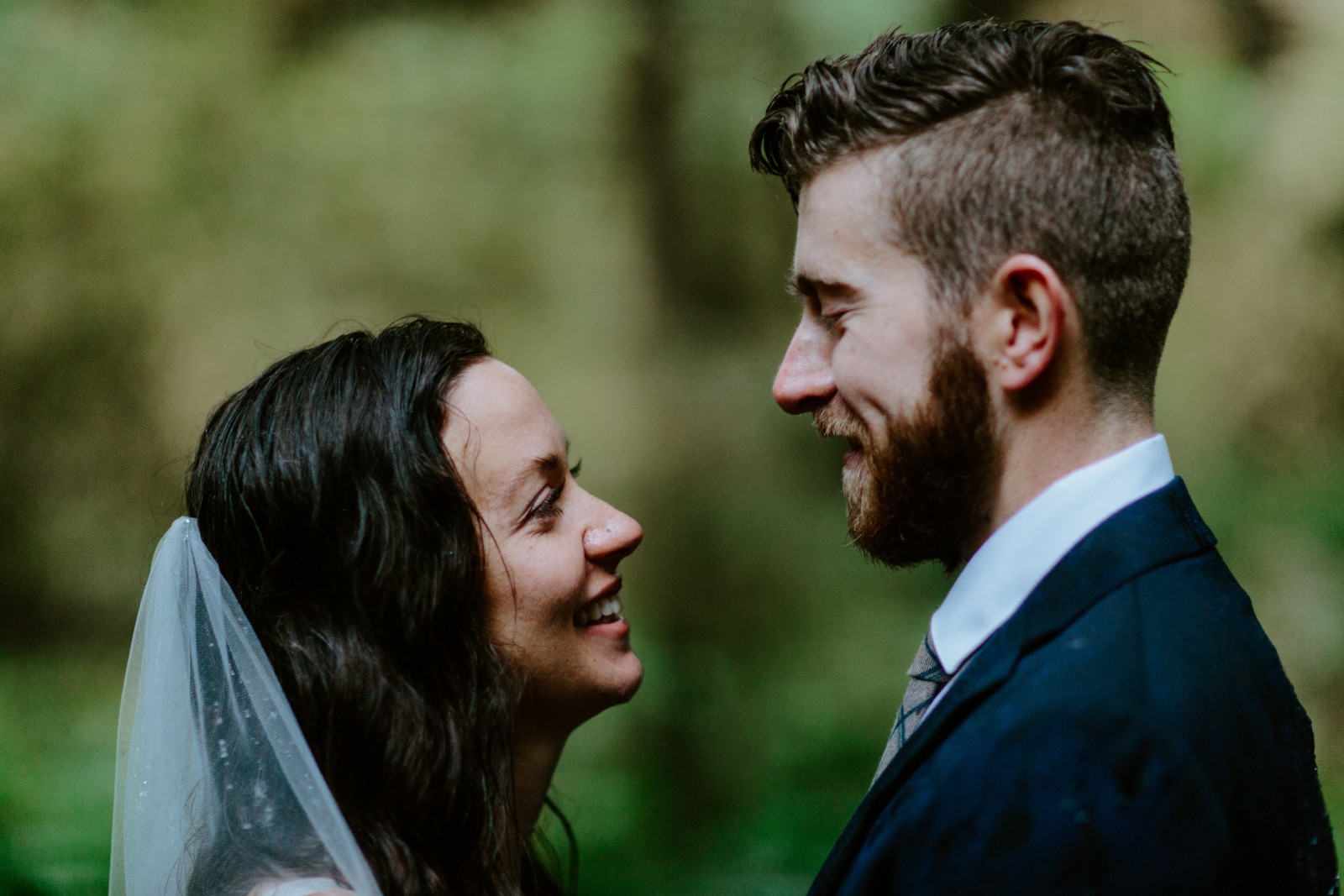 Mollie and Corey smile at each other. Elopement photography in the Olympic National Park by Sienna Plus Josh.