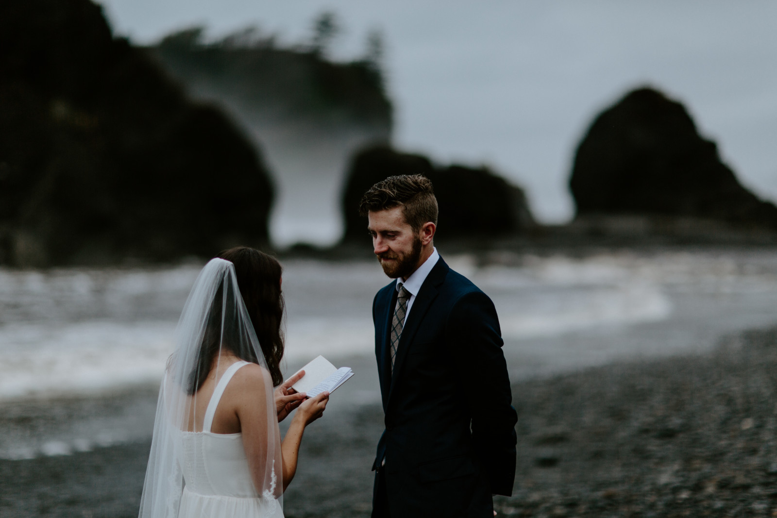 Corey listens to Mollie read her vows. Elopement photography in the Olympic National Park by Sienna Plus Josh.