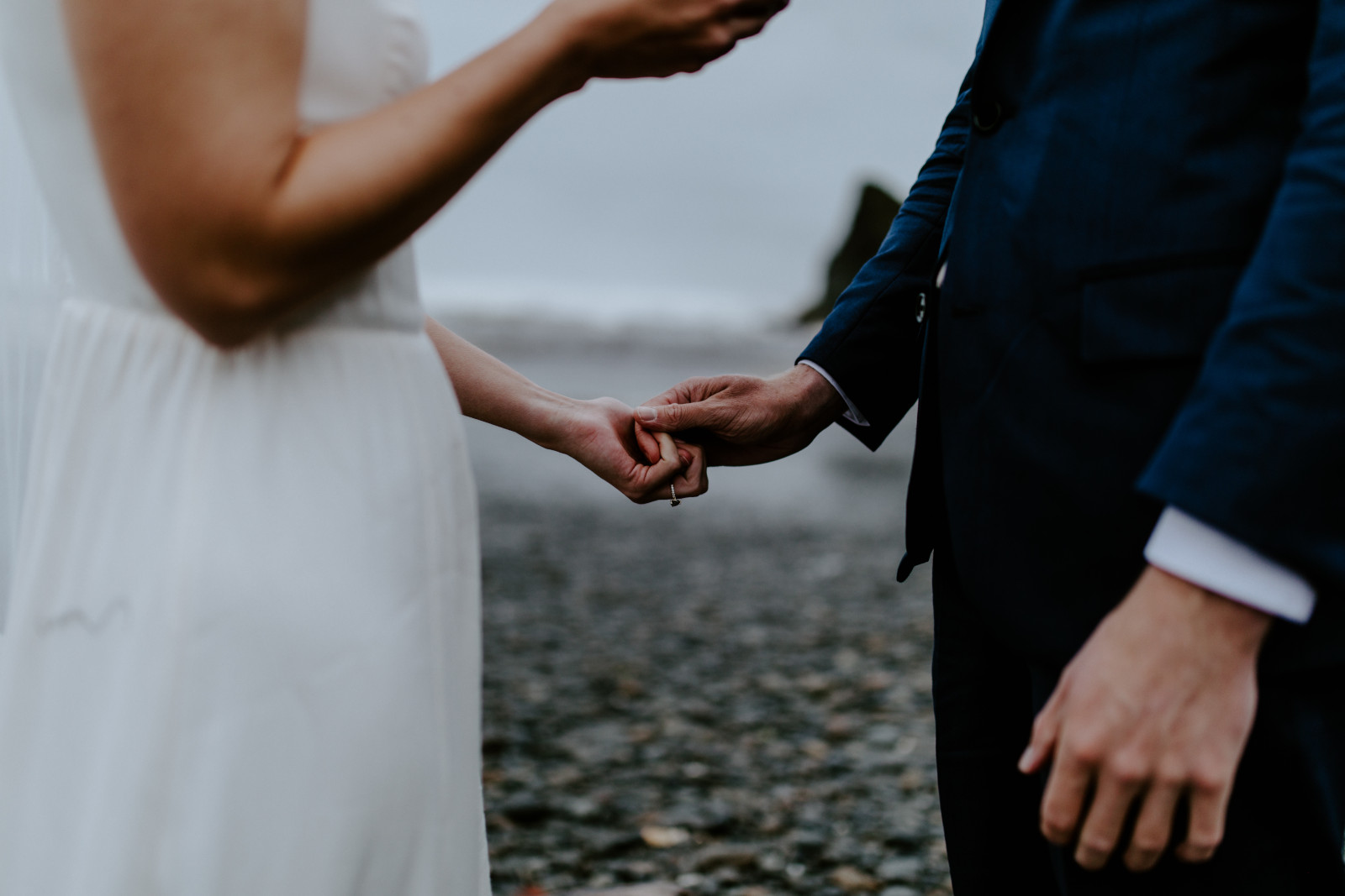 Corey and Mollie hold hands. Elopement photography in the Olympic National Park by Sienna Plus Josh.