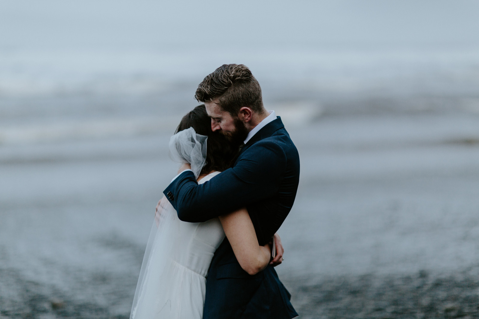 Corey and Mollie hug. Elopement photography in the Olympic National Park by Sienna Plus Josh.