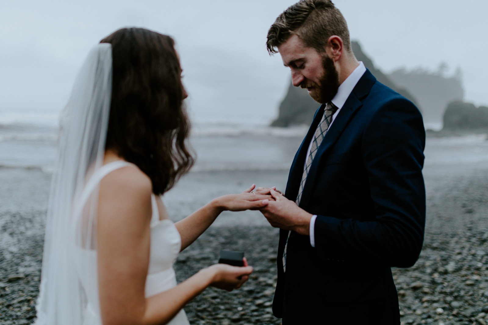Corey holds Mollie's hand. Elopement photography at Olympic National Park by Sienna Plus Josh.