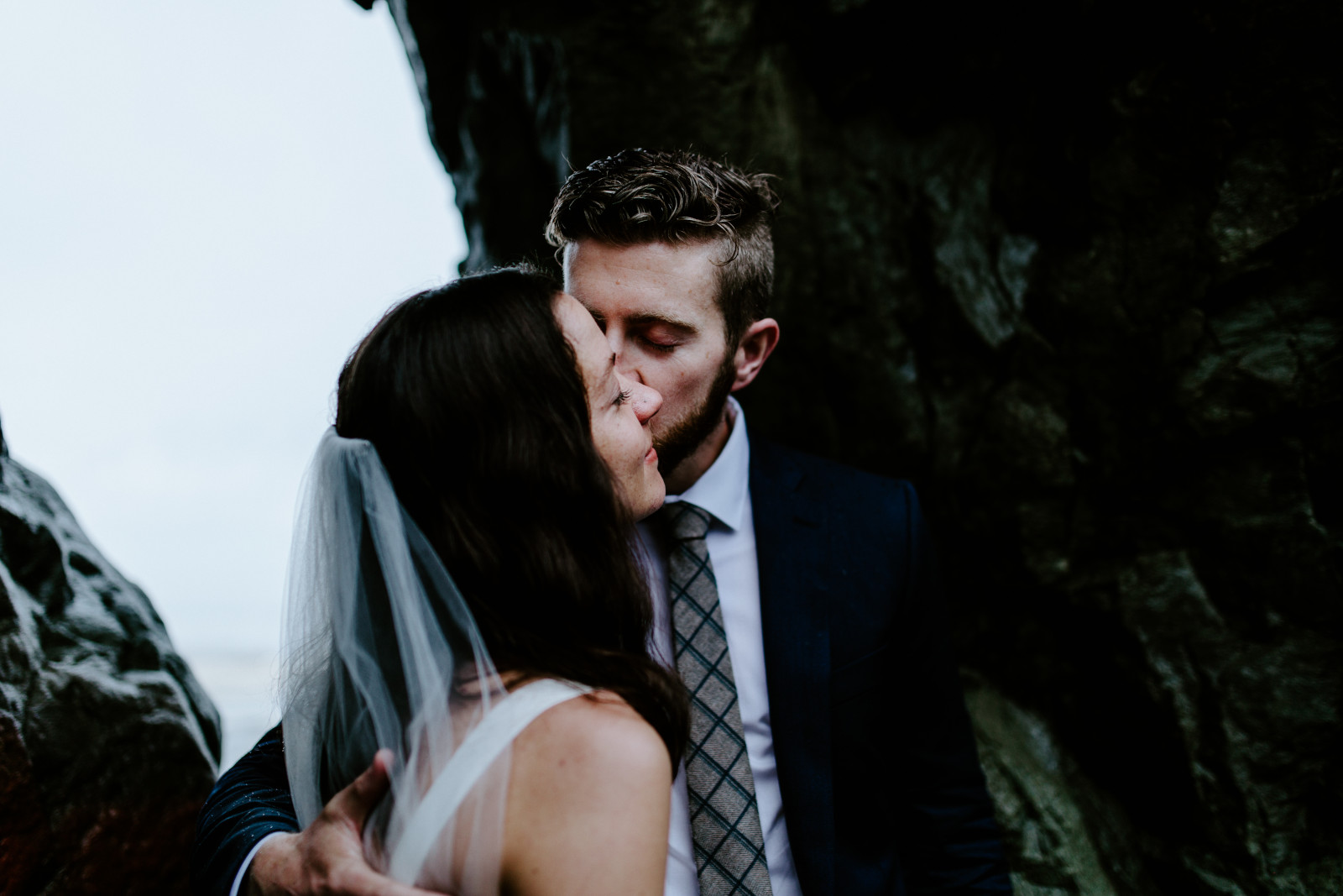 Corey kisses Mollie's cheek. Elopement photography at Olympic National Park by Sienna Plus Josh.