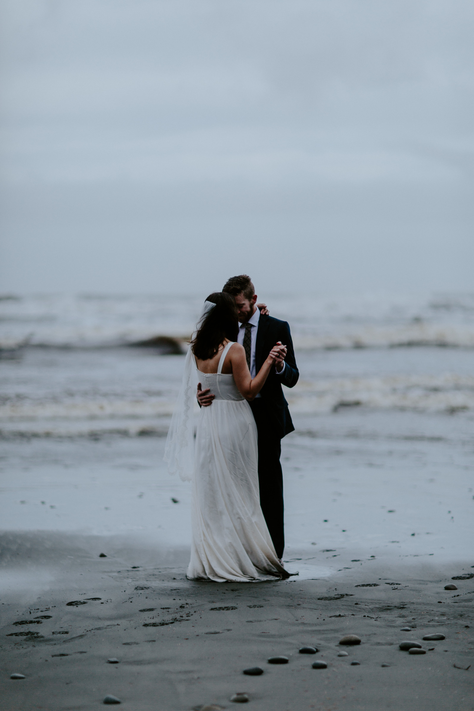 Corey and Mollie share their first dance on the beach. Elopement photography at Olympic National Park by Sienna Plus Josh.