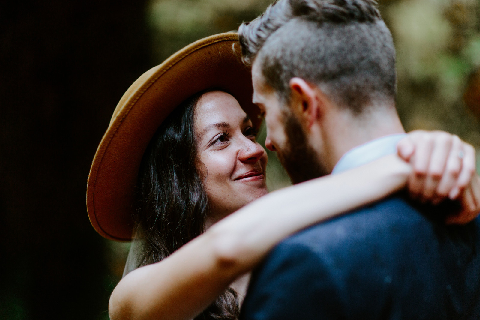 Mollie puts her arms around Corey. Elopement photography in the Olympic National Park by Sienna Plus Josh.