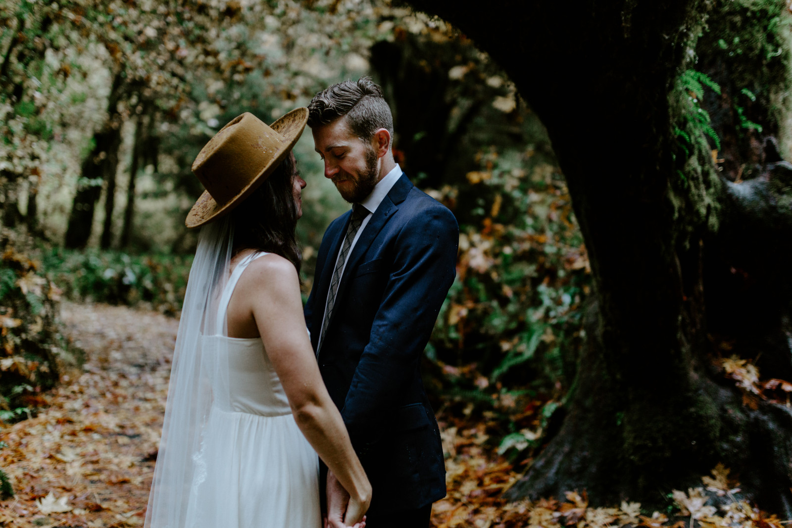 Mollie and Corey hold hands. Elopement photography in the Olympic National Park by Sienna Plus Josh.