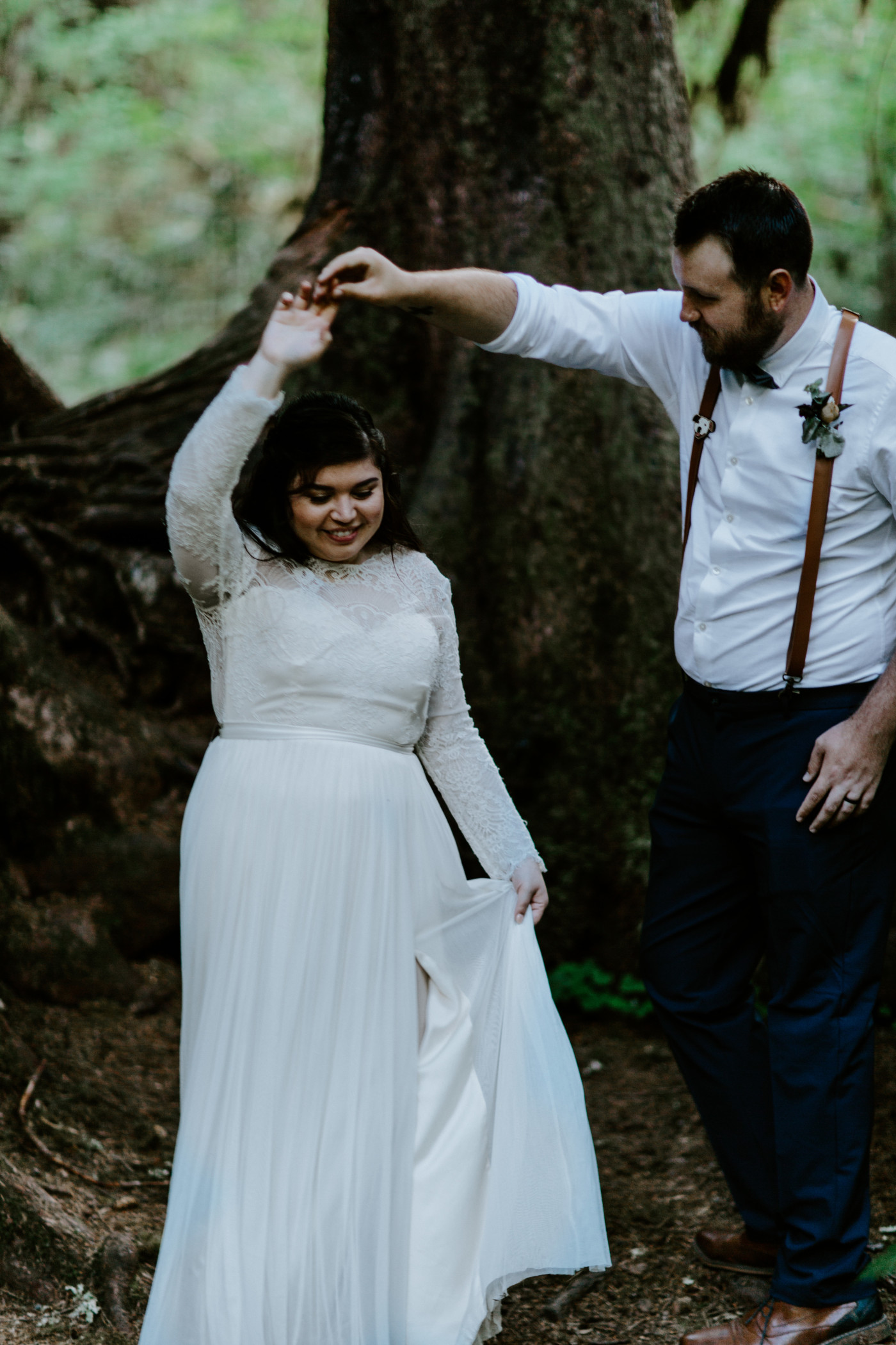 Jack and Brooke dancing in the woods. Elopement photography at Olympic National Park by Sienna Plus Josh.