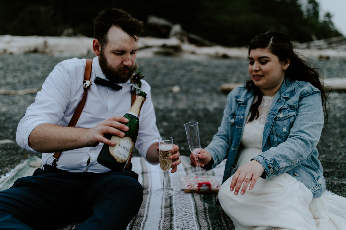 Jack pours champagne for Brooke. Elopement photography at Olympic National Park by Sienna Plus Josh.