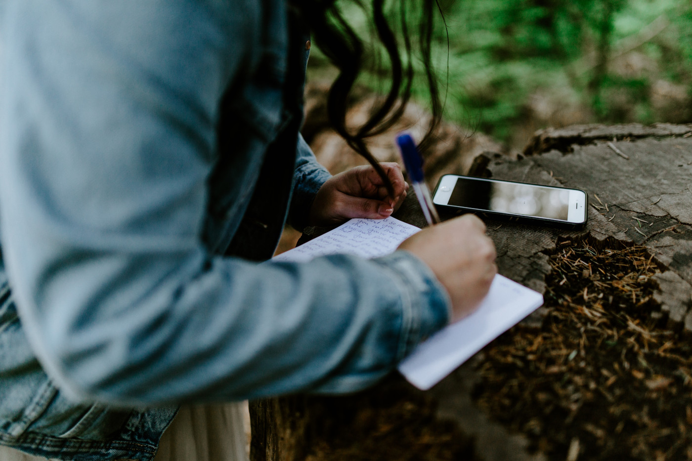 Brooke writes her vows down in her vow book. Elopement photography at Olympic National Park by Sienna Plus Josh.
