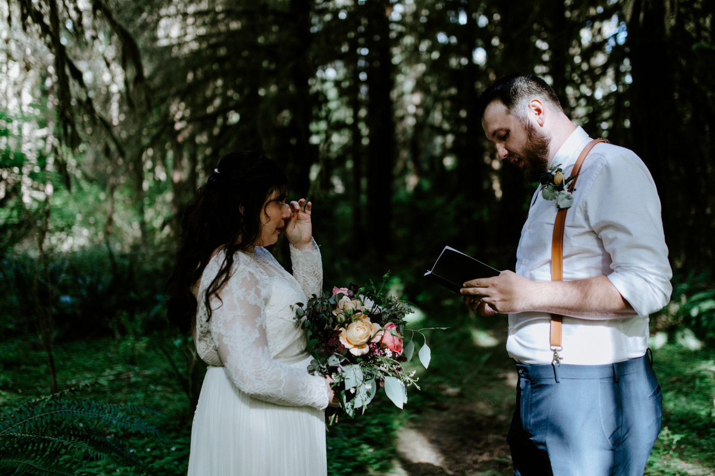 Jack reads vows to Brooke. Elopement photography at Olympic National Park by Sienna Plus Josh.