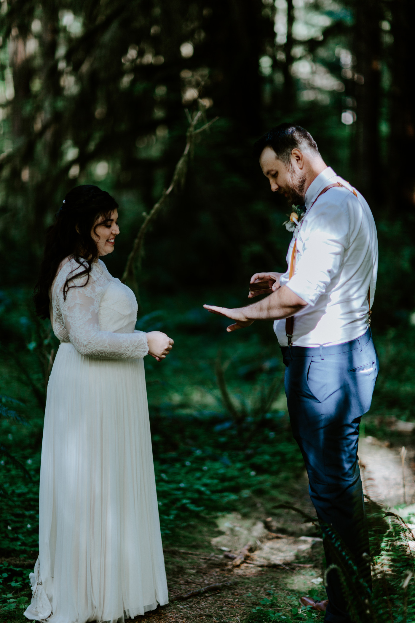 Brooke puts a ring on Jack. Elopement photography at Olympic National Park by Sienna Plus Josh.