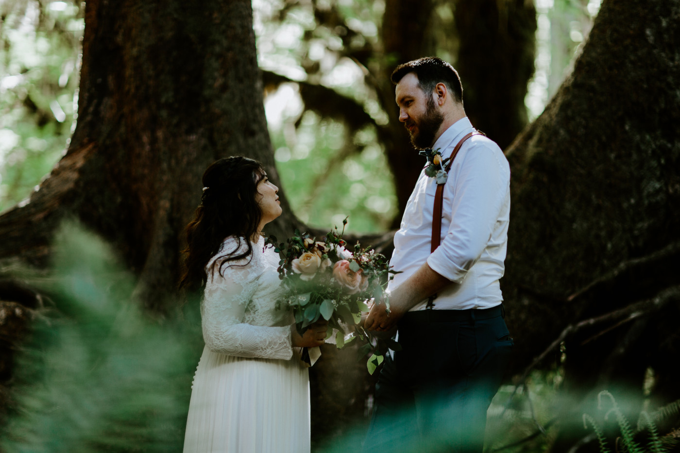 Jack smiles at Brooke. Elopement photography at Olympic National Park by Sienna Plus Josh.