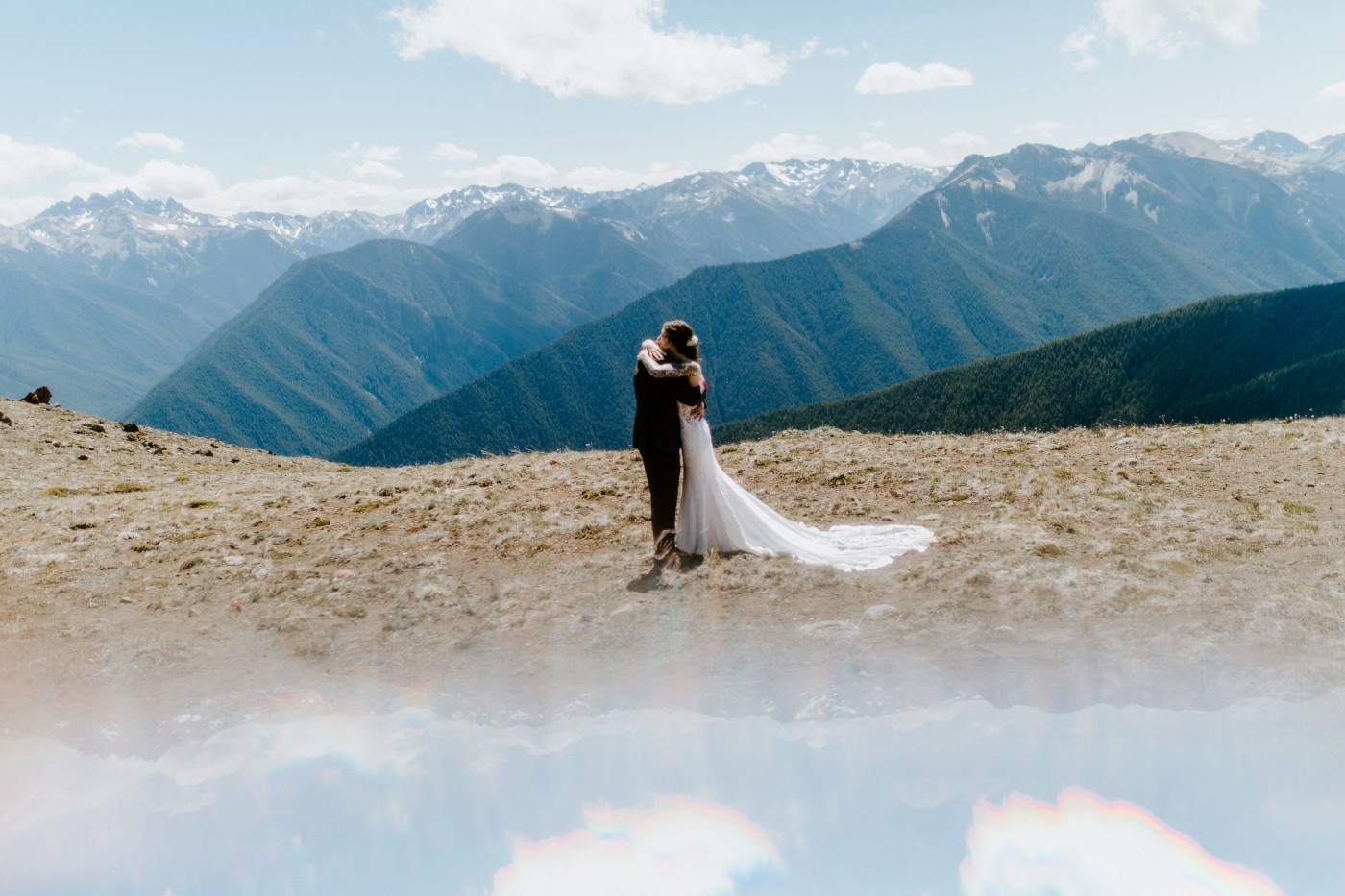 Coty and Adrielle hold each other in a hug at Olympic National Park, Washington.