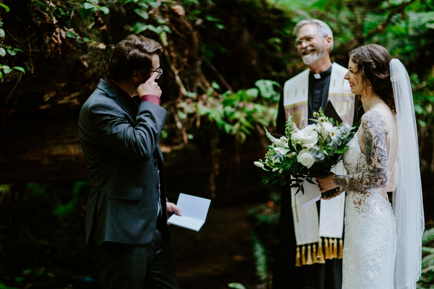 Coty reads his vows to Adrielle during their elopement at Olympic National Park, Washington.