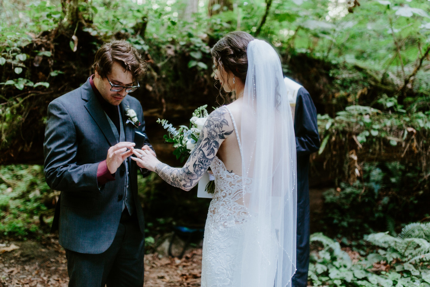 Coty puts a ring on Adrielle during their elopement at Olympic National Park, Washington.