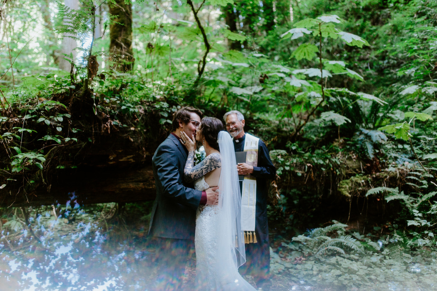 Adrielle and Coty kiss during their elopement at Olympic National Park, Washington.